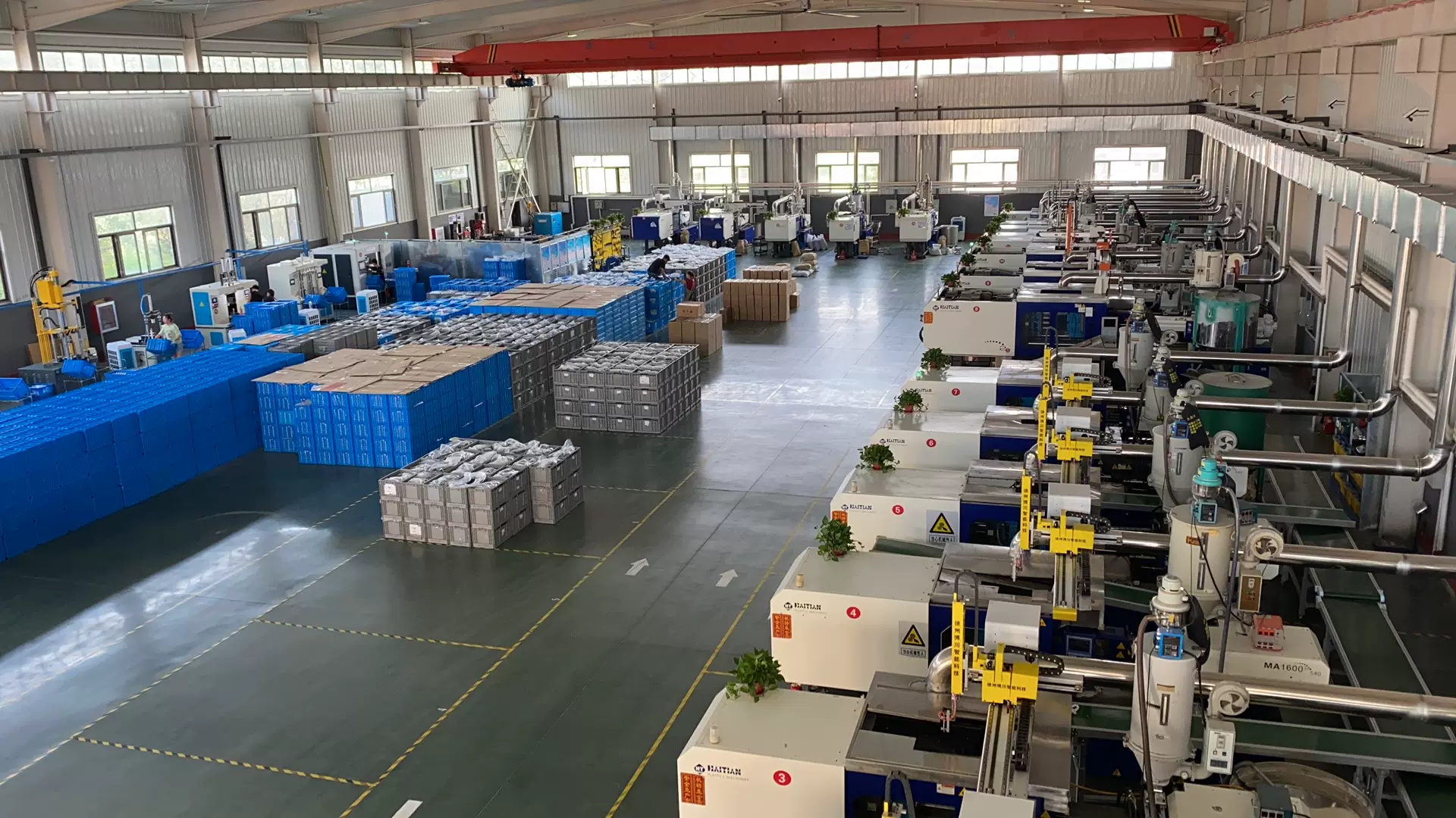Production workshop and injection-molding equipment supporting drain-cleaning products