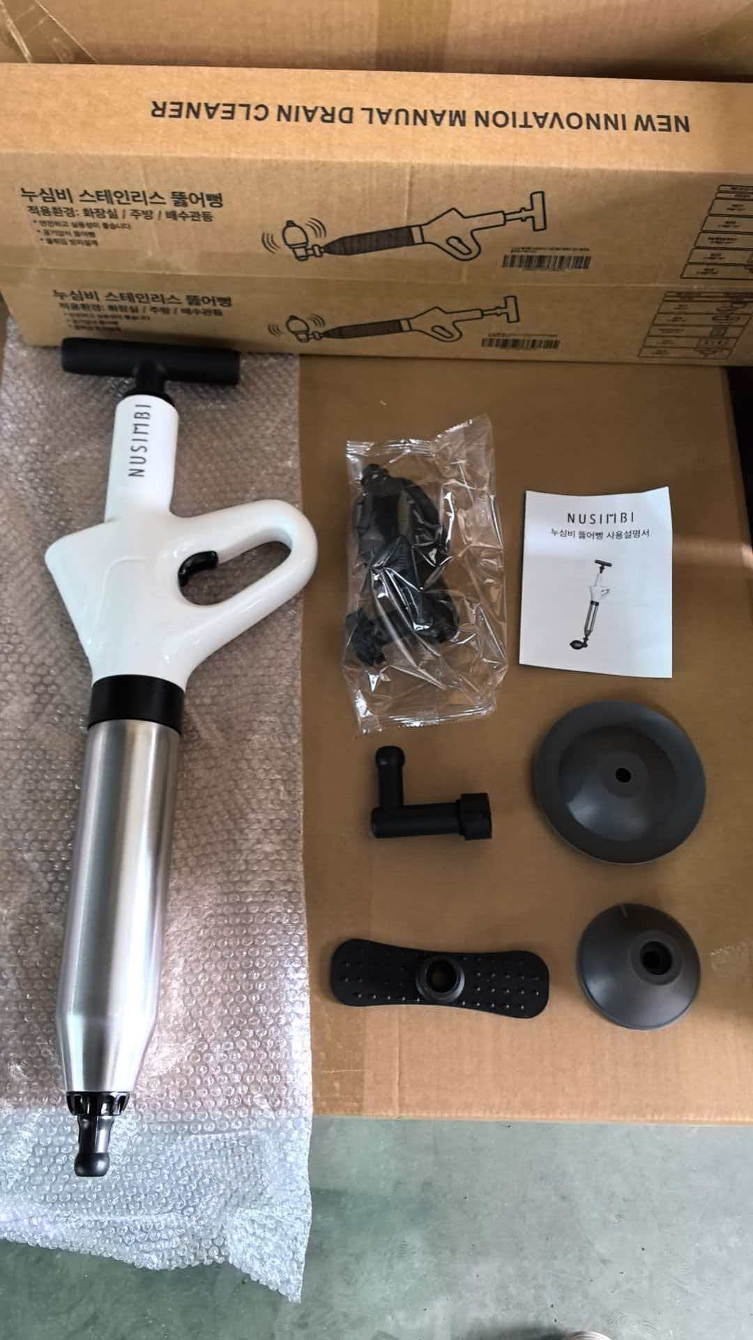Laser marking sample on manual drain cleaner and kit packaging