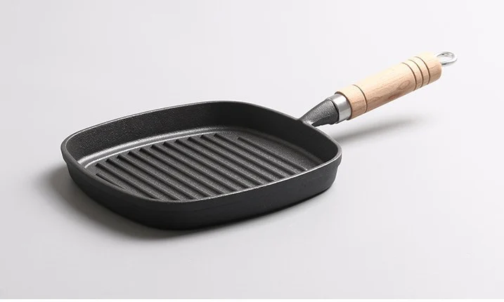 Ribbed square cast iron steak pan with wooden handle