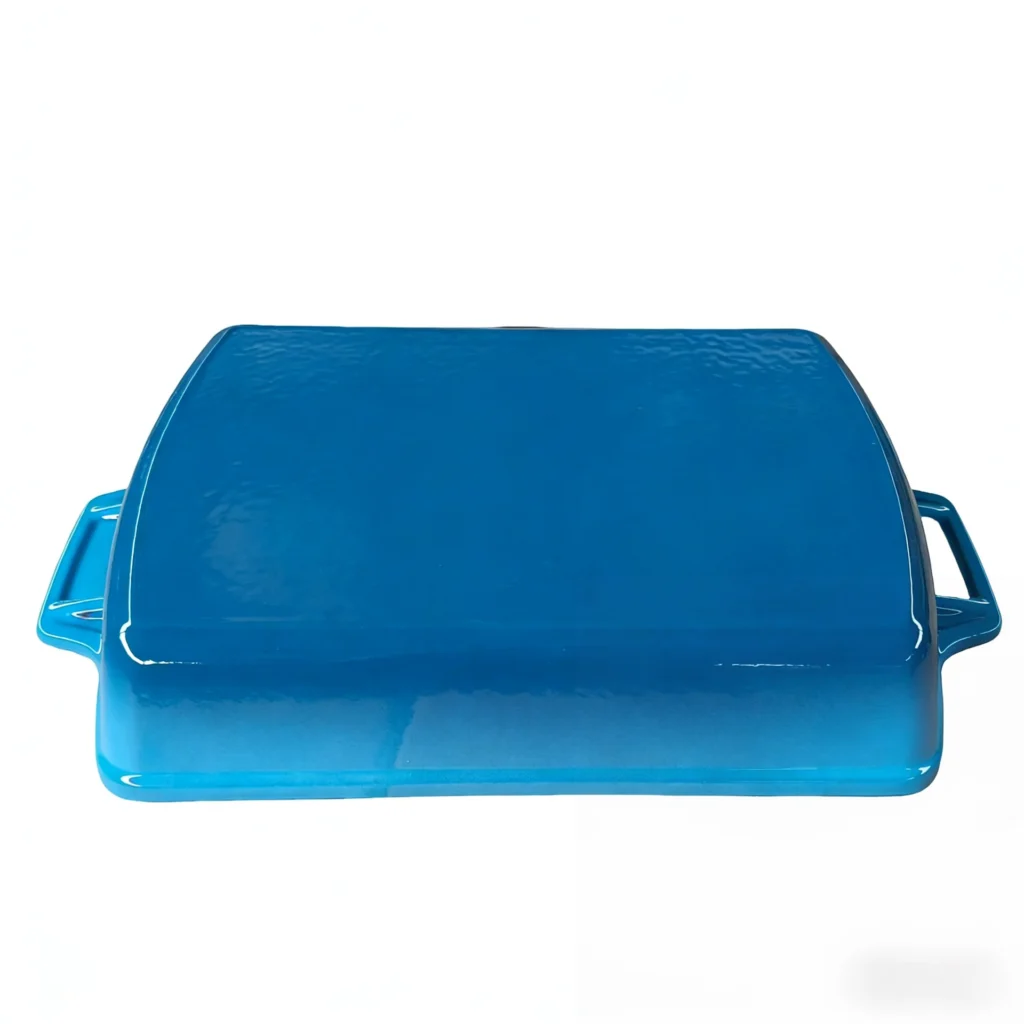 Blue enameled cast iron rectangular baking dish with side handles