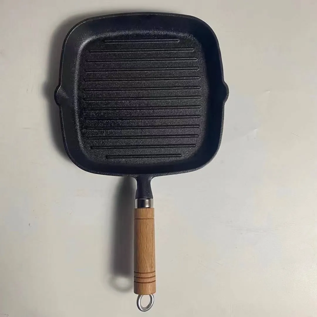 Square cast iron grill pan with wooden handle