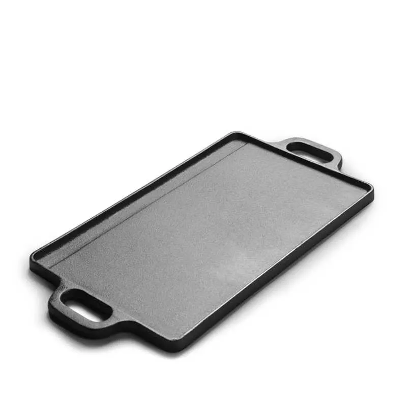 Flat side of reversible cast iron griddle