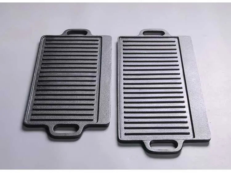 Reversible cast iron griddle surfaces