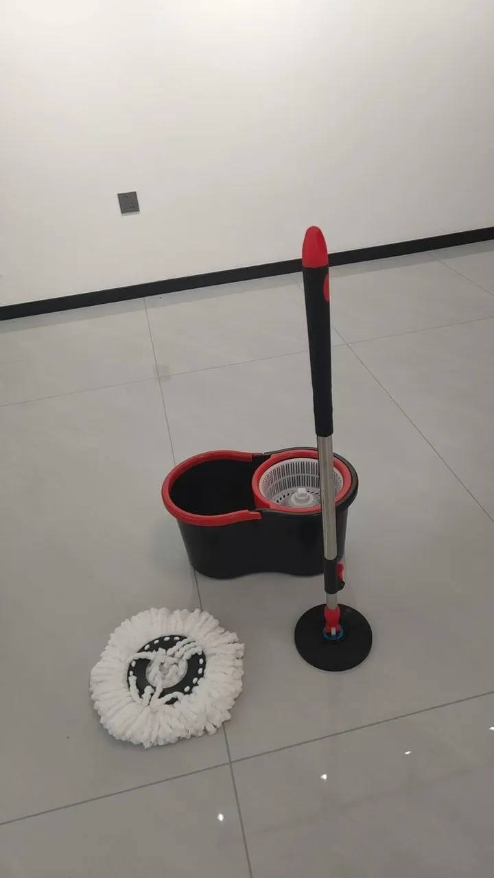 Assembled WC-MOP001 spin mop beside compact bucket